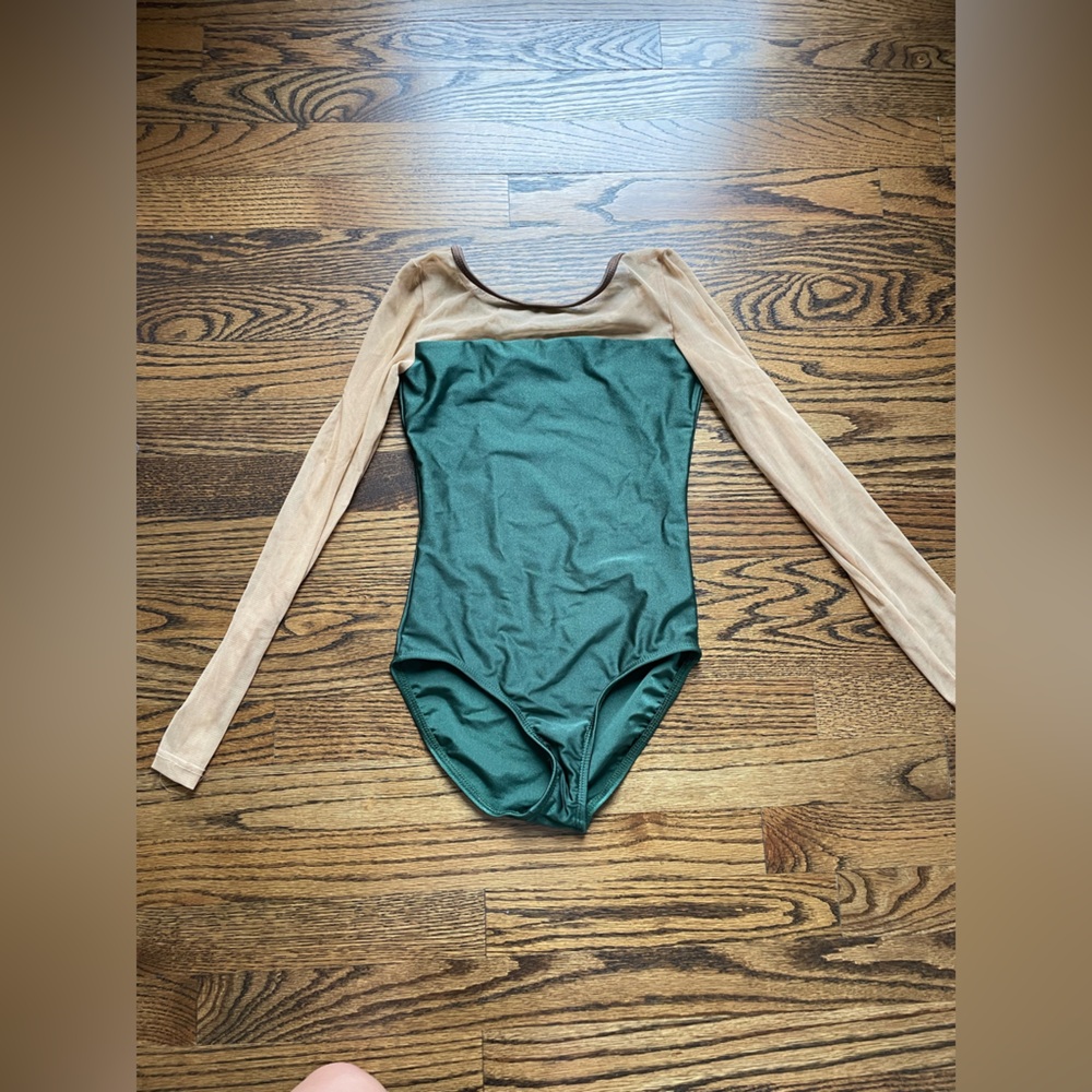 Green leotard with tan mesh long sleeves